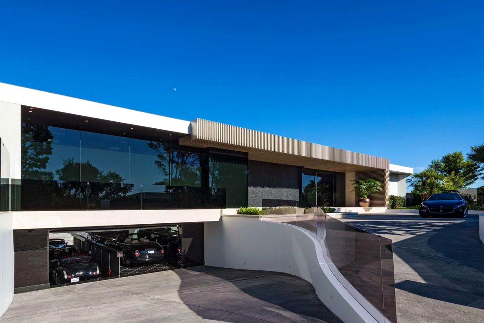 Pool and open pavilion at a modern residence