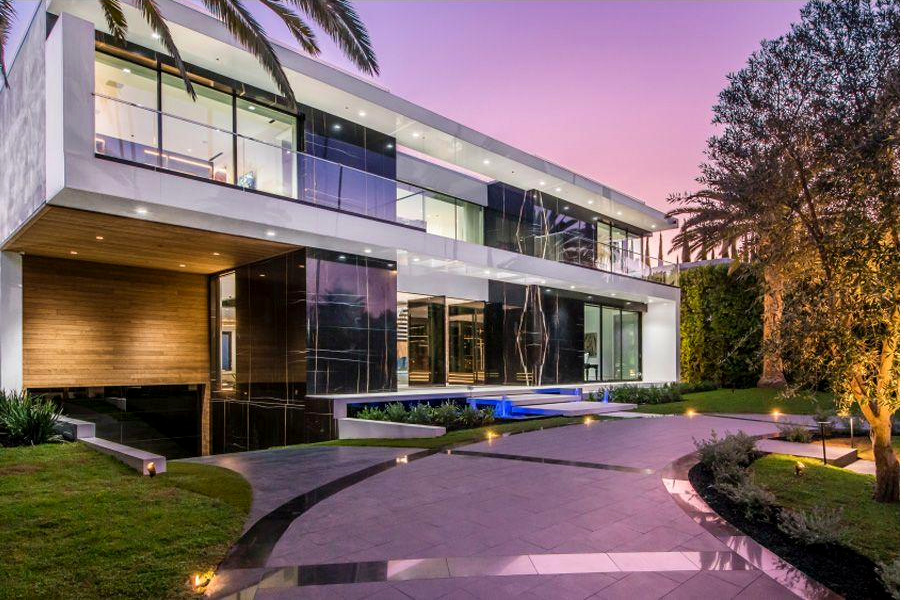 Modern residence elevation at dusk